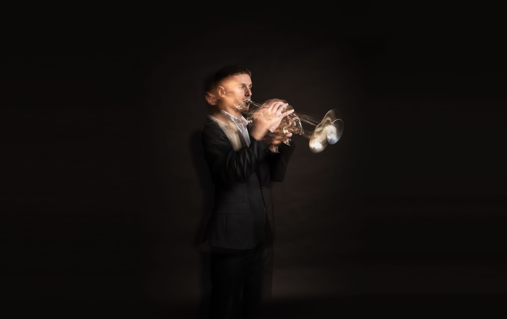 A QSO trumpeter, from the orchestra's 80th anniversary season campaign photography.