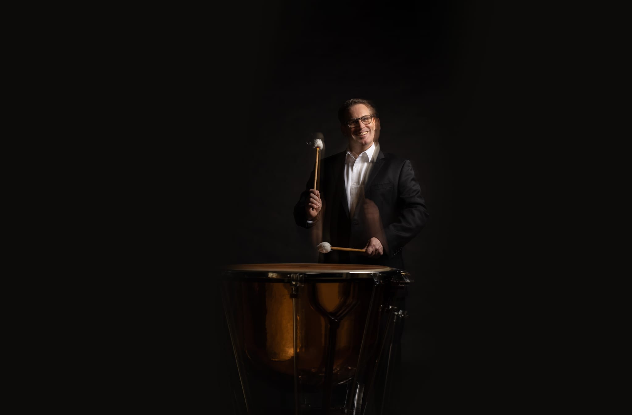 A QSO timpanist, from the orchestra's 80th anniversary season campaign photography.